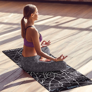 Woman with custom DC print yoga mat