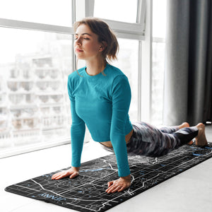 Woman doing yoga with personalized Denver print yoga mat